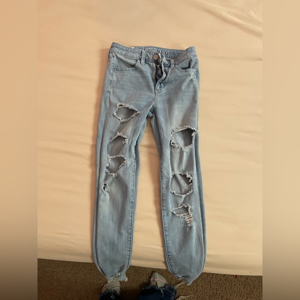 Ripped high rise denim skinny jeans